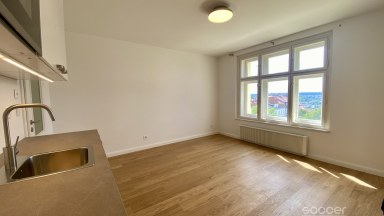 Zcela nový byt krásným výhledem v Korunní ulici, Vinohrady.