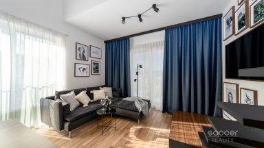 Prodej loftového bytu 1+kk s balkonem, sklepem a garážovým stáním – Bydlení na Krejcárku, Praha 9