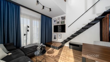 Prodej loftového bytu 1+kk s balkonem, sklepem a garážovým stáním – Bydlení na Krejcárku, Praha 9