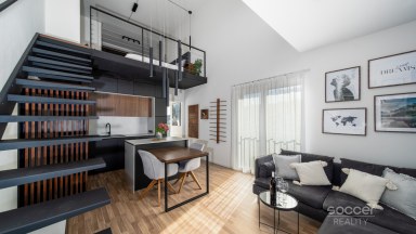 Prodej loftového bytu 1+kk s balkonem, sklepem a garážovým stáním – Bydlení na Krejcárku, Praha 9