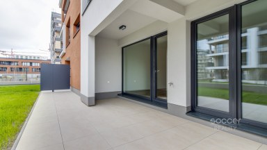 Pronájem bytu 2+kk s terasou a předzahrádkou v rezidenci Tesla Hloubětín. 